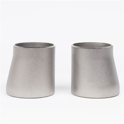 Reducer eċċentriku mingħajr saldatura tat-titanju